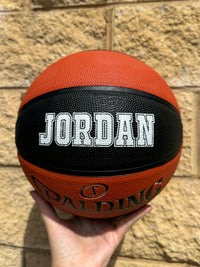 Load image into Gallery viewer, Personalised Spalding Rubber Basketball TF 150 - Black/Orange (Size 5)
