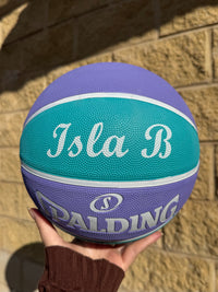 Load image into Gallery viewer, Personalised Spalding WNBL Rubber Basketball Teal &amp; Purple (Size 5, 6)
