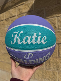 Load image into Gallery viewer, Personalised Spalding WNBL Rubber Basketball Teal &amp; Purple (Size 5, 6)
