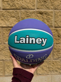 Load image into Gallery viewer, Personalised Spalding WNBL Rubber Basketball Teal &amp; Purple (Size 5, 6)
