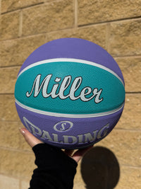 Load image into Gallery viewer, Personalised Spalding WNBL Rubber Basketball Teal &amp; Purple (Size 5, 6)
