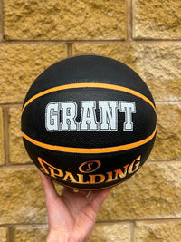 Load image into Gallery viewer, Personalised Spalding Rubber Black/Orange Highlight Foil Basketball (Size 6, 7)
