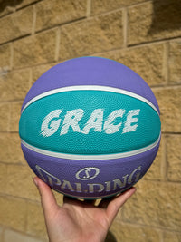 Load image into Gallery viewer, Personalised Spalding WNBL Rubber Basketball Teal &amp; Purple (Size 5, 6)
