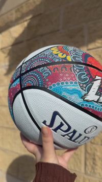 Load and play video in Gallery viewer, Personalised Spalding NBL White Indigenous Basketball (Size 7)
