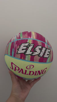 Load and play video in Gallery viewer, Personalised Spalding Pink Multi Marble Glow Rubber Basketball (Size 5, 6)
