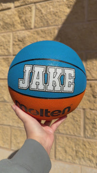 Load and play video in Gallery viewer, Personalised Molten BCR2 Orange/Cyan Rubber Basketball (Size 5)
